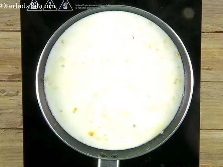Step 5 – Add the milk, mix well and cook on a medium flame for 1 minute, while …