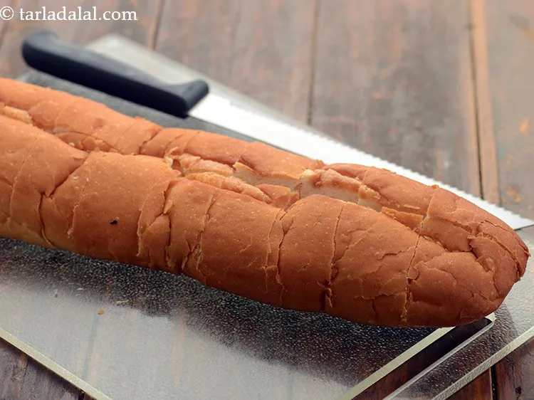 Step 7 – Then make diagonal slit using a bread knife at an equal distance as shown in …