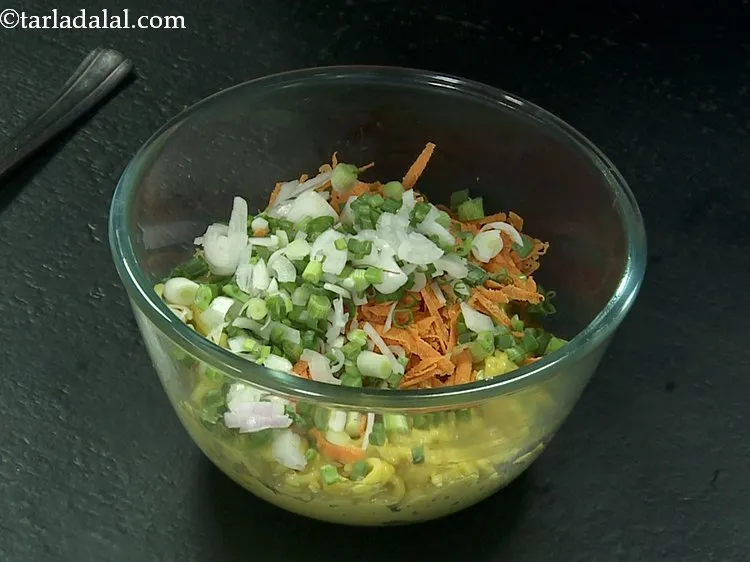 Step 10 – Add spring onions. These vegetables provide an added crunch.