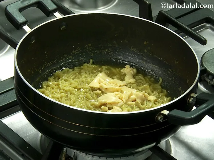 Step 6 – Add the cheese slice. It can be swapped with grated processed cheese.