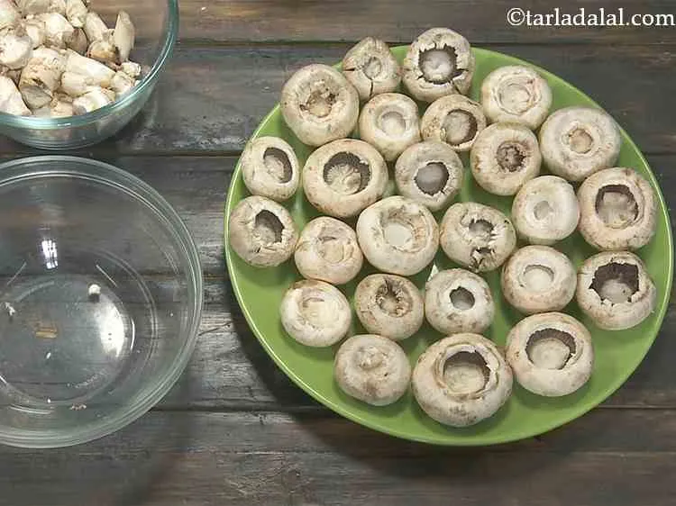 Step 12 – Choose fairly large mushrooms. Remove the stems of the button mushrooms. You can use any …