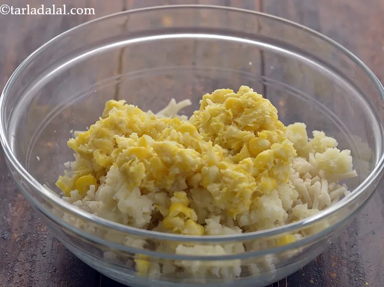 Step 14 – Also, add coarsely crushed corn kernels. We have boiled the makai before adding. Additionally, you …