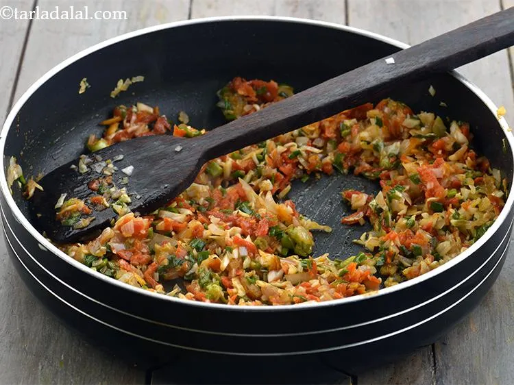 Step 12 – Mix well and cook on a medium flame for 1 minute, while stirring occassionally.