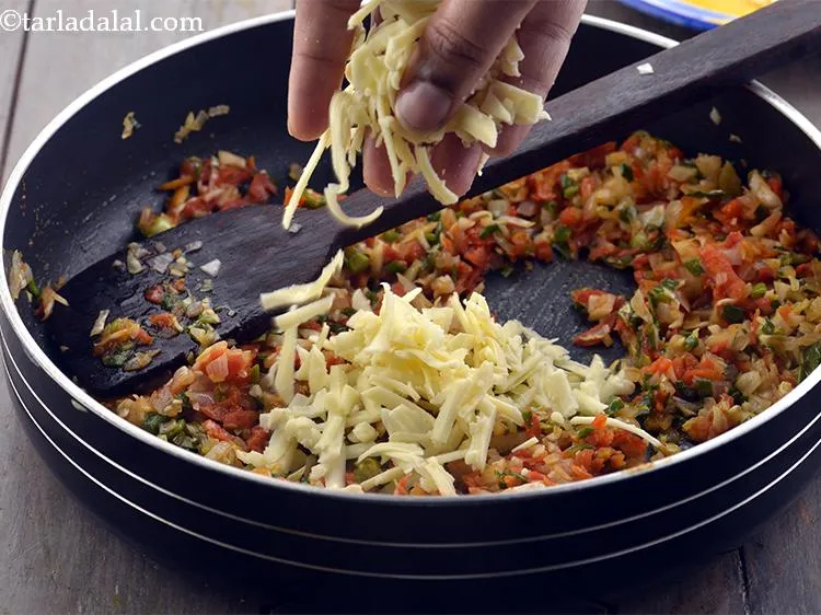 Step 13 – Now it&rsquo;s time to add the cheese which is the showstopper of this <strong>Cheesy onion …