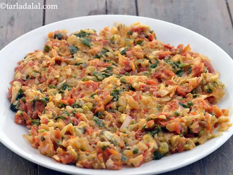 Step 14 – Turn the flame off and mix well till the cheese melts.