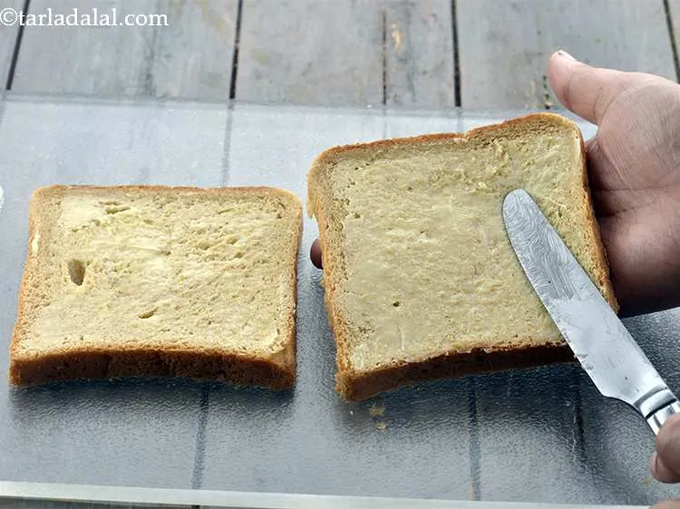 Step 17 – Apply 1/2 tsp of butter onto each bread slice.