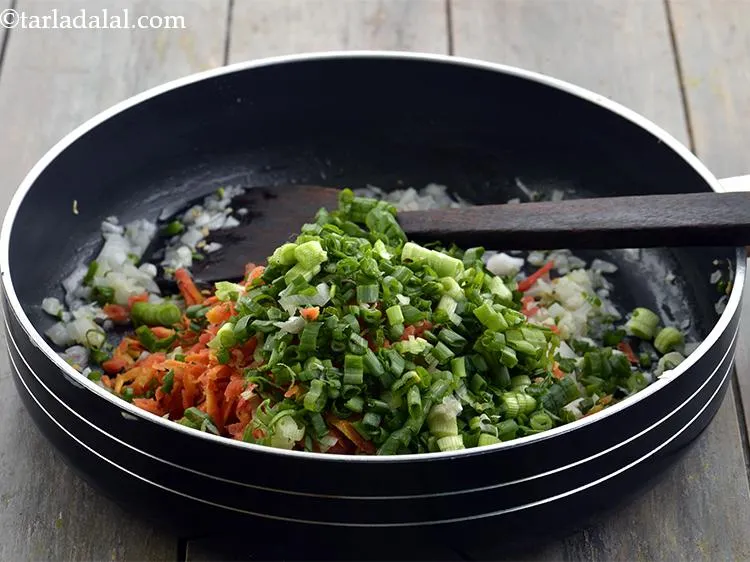 Step 8 – Likewise, add the spring onion greens, mix well and saut&eacute; on a medium flame for …
