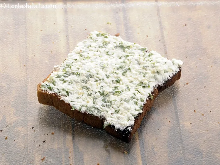 Step 9 – Spread a portion of the spread evenly over it.&nbsp;