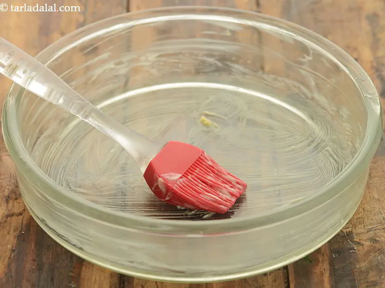 Step 29 – Grease a shallow dish using &frac12; tsp of butter.