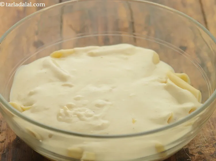 Step 23 – Add prepared white sauce.
