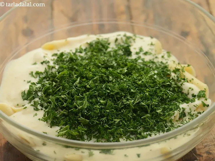 Step 24 – Add parsley. Kick it up by adding pressed garlic if you are a garlic lover.