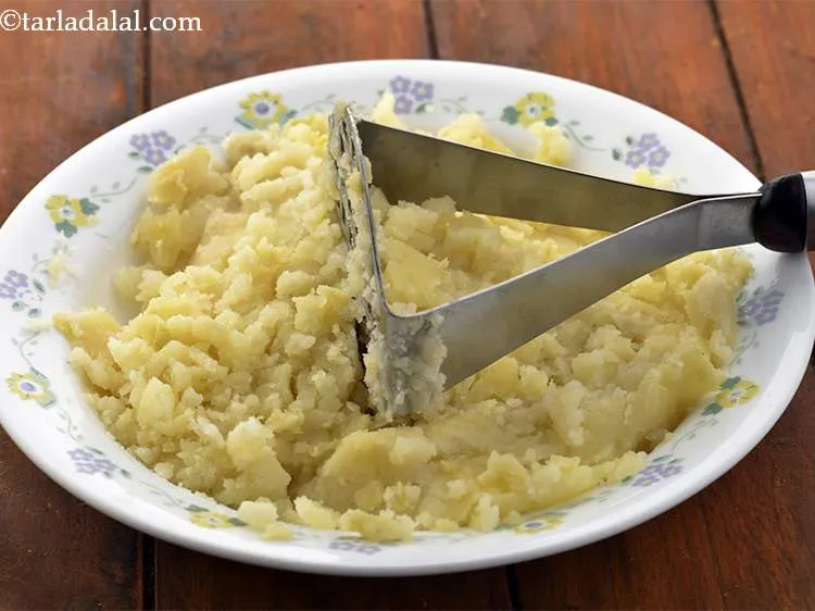 Step 5 – Mash the potatoes with the help of a potato masher and keep aside. If the …