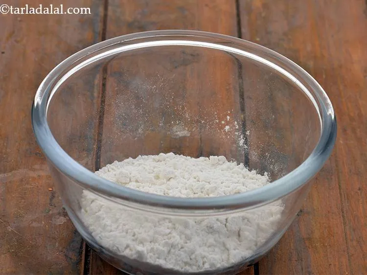 Step 8 – For making the cheesy potato balls, we will first prepare slurry. For that, in a …