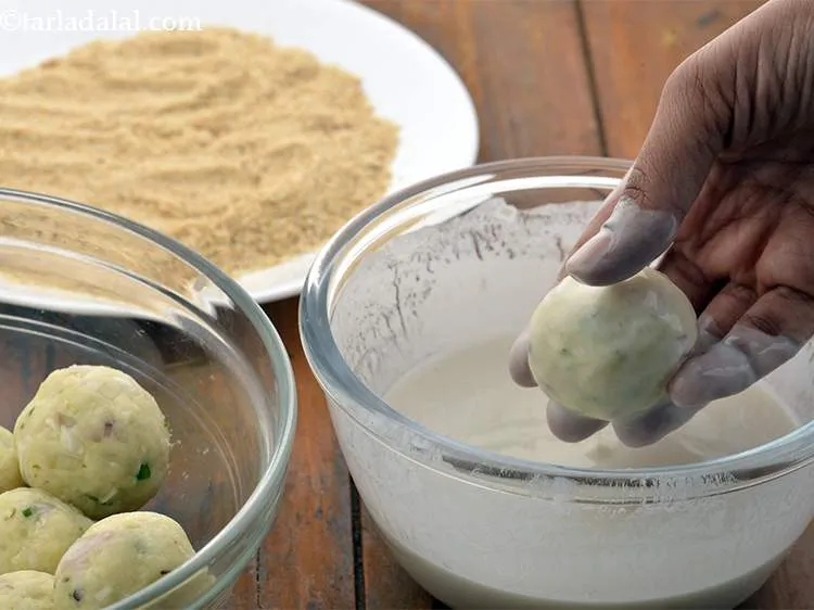Step 17 – Dip a ball in the prepared plain flour-water mixture.