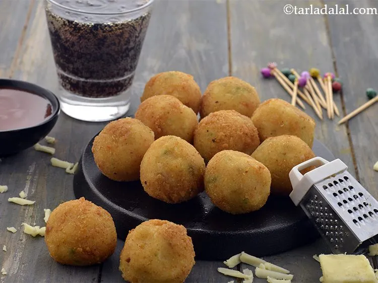 Step 22 – Serve the&nbsp;<strong>Cheesy Potato Balls (Potato Cheese Balls)</strong>&nbsp;immediately with tomato ketchup.