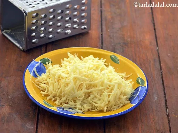 Step 6 – Also, grate the processed cheese block and keep ready. We will require 1 cup so, …
