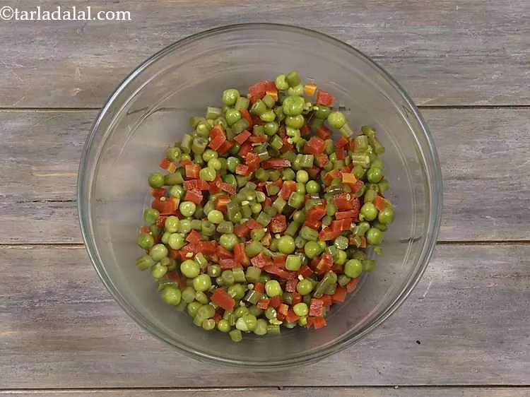 Step 30 – Ensure that the boiled vegetables are strained well. Presence of water will make shaping the …