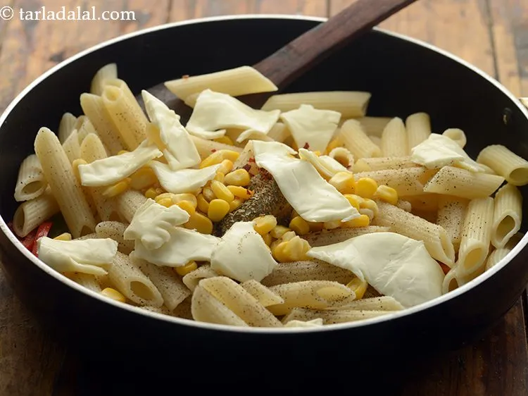 Step 10 – Add torn cheese slices.