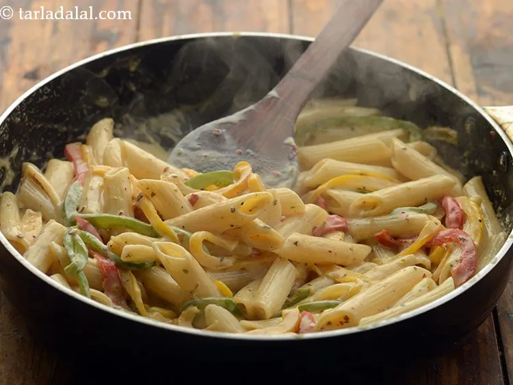 Step 11 – Mix&nbsp;<strong>cheesy vegetable&nbsp;pasta</strong><strong>&nbsp;| quick kids cheesy vegetable&nbsp;pasta| Indian style cheese veg pasta |</strong>&nbsp;well and cook on …