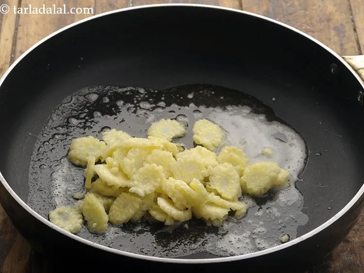 Step 14 – Add all the vegetables starting with sliced and blanched baby corn.