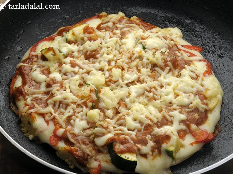 Step 36 – Remove on a plate or dry surface once the cheese melts and it looks crispier.&nbsp;