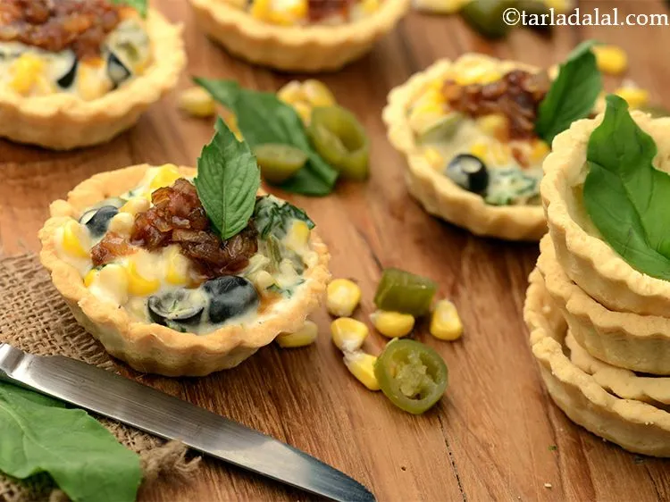 Step 20 – Serve immediately garnished with basil leaves. You can also garnish with an olive slice.&nbsp;