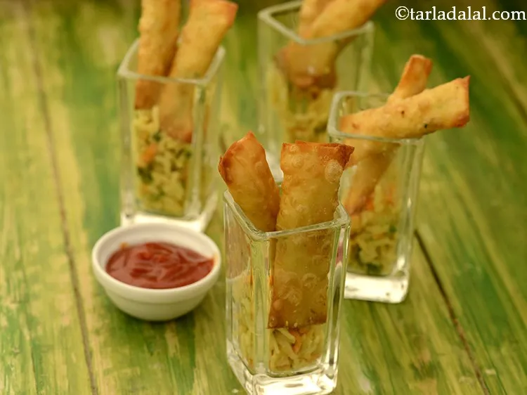 Step 25 – Serve the <strong>cheesy maggi rolls</strong> immediately with chilli sauce.