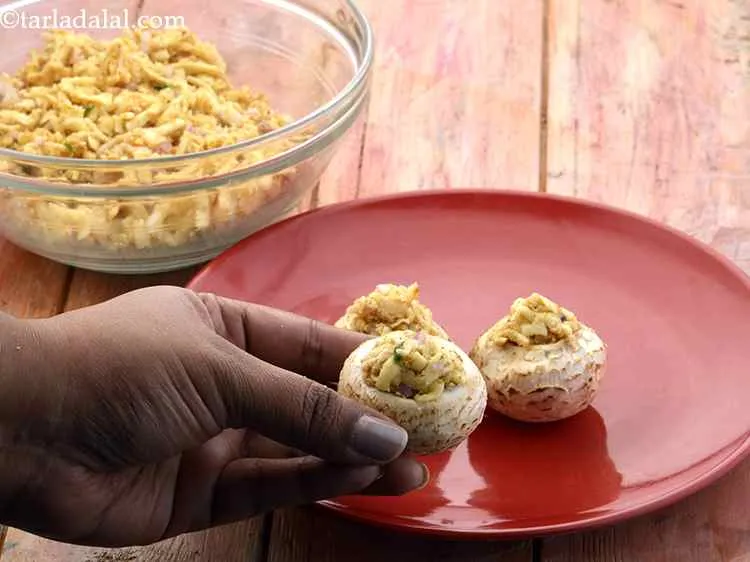 Step 14 – Stuff each mushroom cap with a portion of the stuffing using your hands or a …