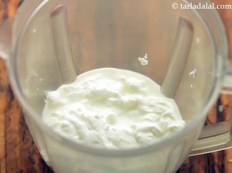 Step 6 – Further, in a big blender jar, add curd.&nbsp;