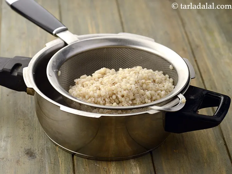 Step 6 – Allow the steam to escape before opening the lid. Drain and keep aside.