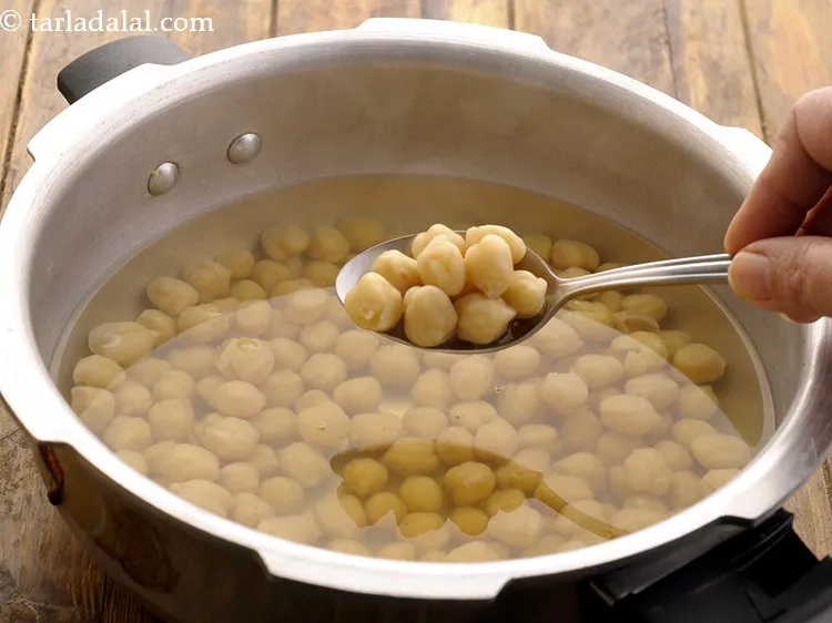 Step 35 – Pressure cook it for 3 to 5 whistles over a medium flame. Allow the steam …