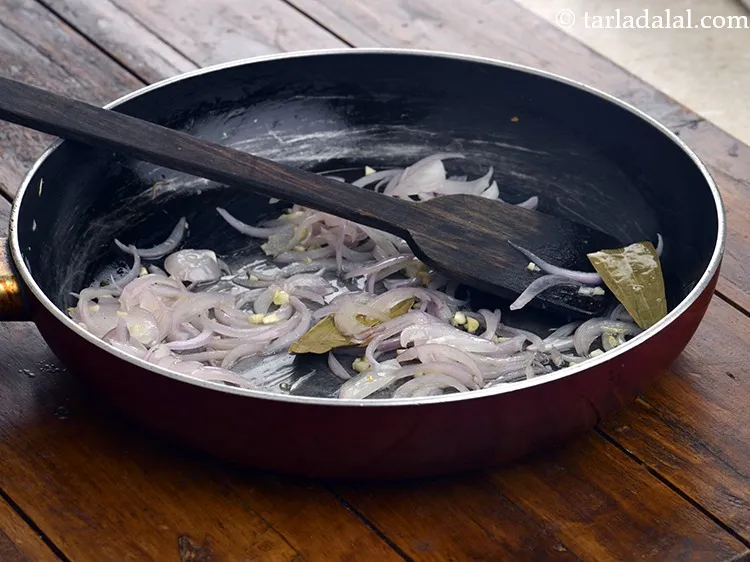 Step 41 – Saut&eacute; on a medium flame till the onions turn brown.<br /> &nbsp;