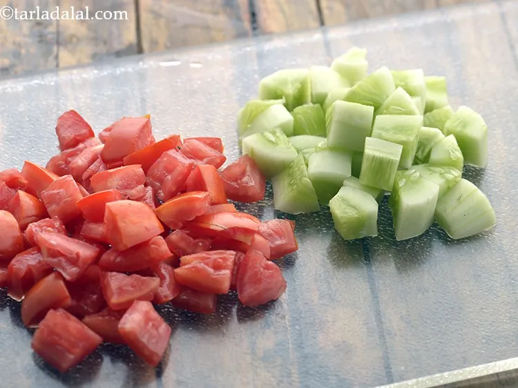 Step 8 – Chop the tomato and cucumber into cubes.