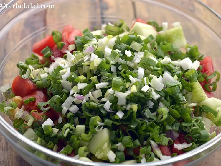 Step 20 – Add chopped spring onion greens and whites.