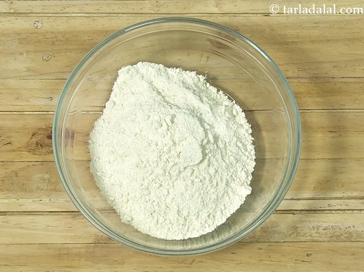 Step 12 – To make dough for <strong>vegetable and cheese paratha</strong>, in a deep bowl, take whole wheat …