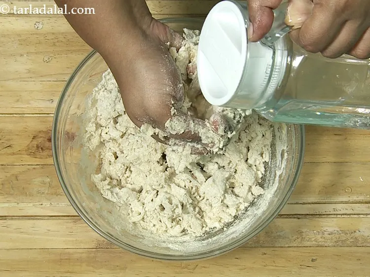 Step 15 – Gradually, add water to combine all the ingredients.