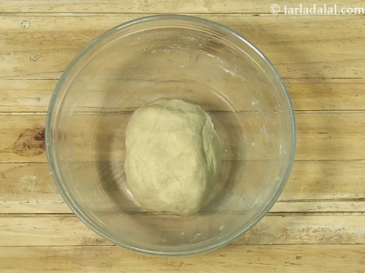 Step 16 – Mix well and knead into a semi-soft dough using enough water. The quantity of water …