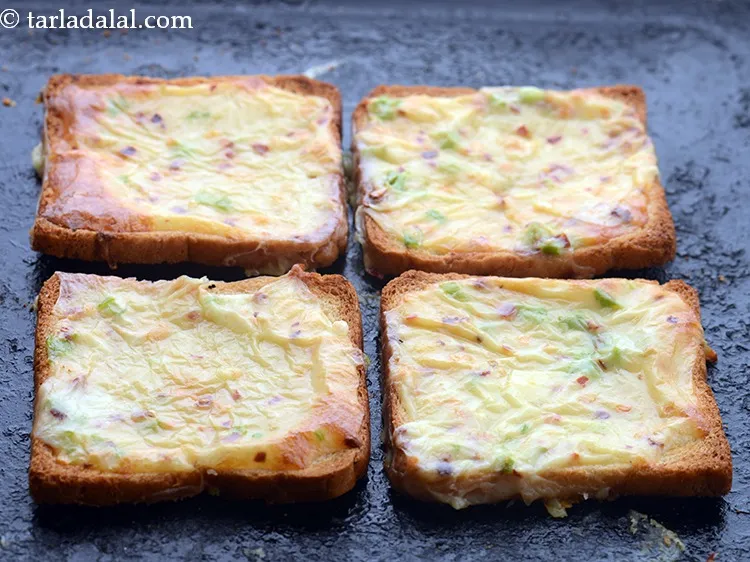 स्टेप 12 – <strong>चिली चीज़ टोस्ट</strong> को पहले से गरम ओवन में २००&deg;से …