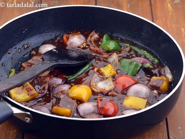 Step 38 – Mix well and cook on a medium flame for 1 minute or till thick, while …