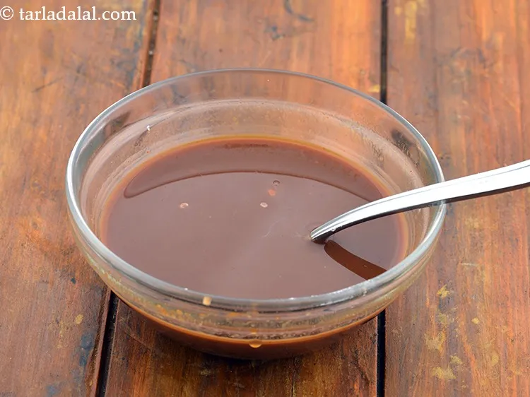 Step 28 – Mix well using a spoon or whisk to get a lump free mixture. Keep aside.&nbsp;