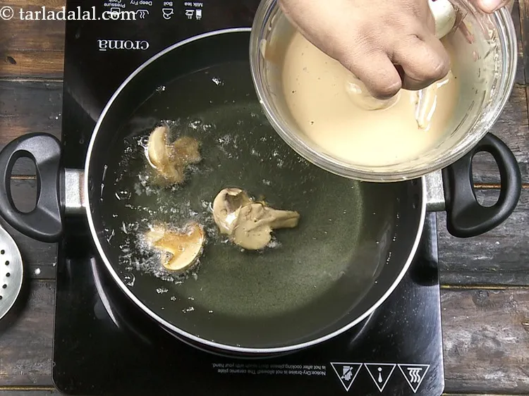 Step 19 – Add it to the hot oil.&nbsp;