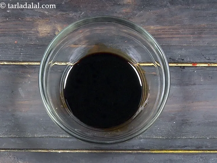 Step 22 – For the soy sauce-cornflour mixture, add 1 tbsp&nbsp;<a href="https://www.tarladalal.com/glossary-soy-sauce-soya-sauce-864i">soy sauce</a> in a bowl.&nbsp;