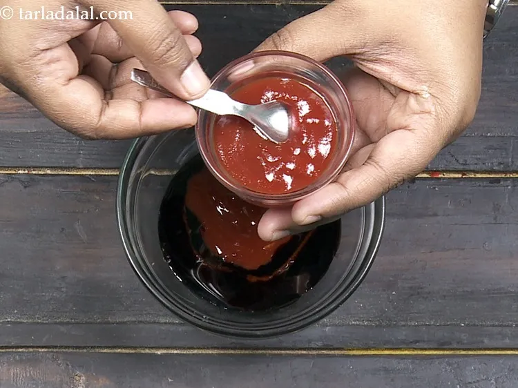 Step 24 – Add 1 tbsp&nbsp;<a href="https://www.tarladalal.com/glossary-tomato-ketchup-tomato-sauce-181i">tomato ketchup</a>.