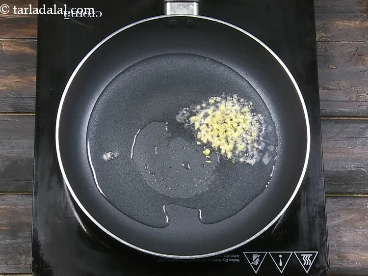 Step 30 – Add 1 tsp&nbsp;finely&nbsp;<a href="https://www.tarladalal.com/glossary-chopped-ginger-786i">chopped ginger (adrak)</a>.