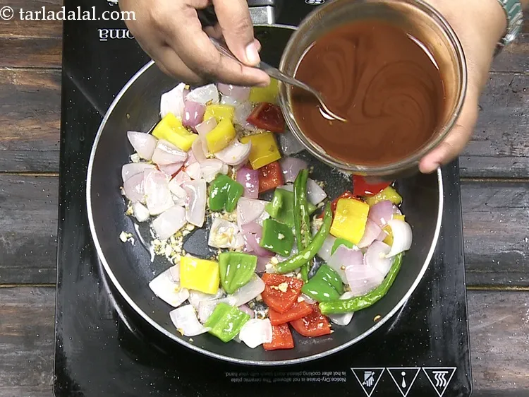 Step 37 – Add the prepared soy sauce-cornflour mixture. Always mix the mixture once before adding as cornflour …