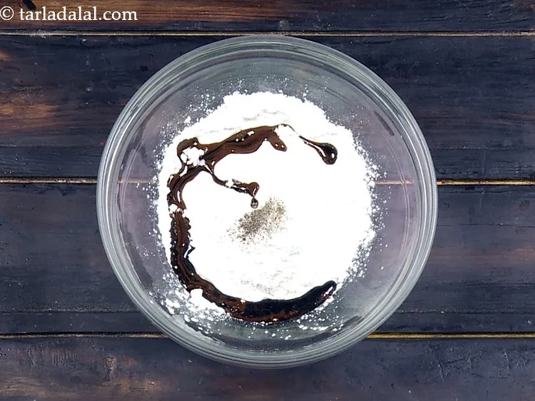 Step 13 – Add 1/2 tbsp&nbsp;<a href="https://www.tarladalal.com/glossary-soy-sauce-soya-sauce-864i">soy sauce</a>.