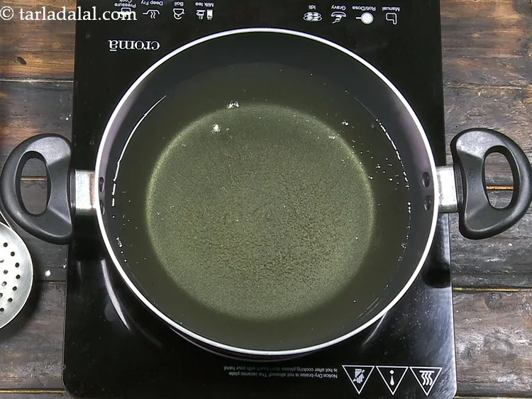 Step 17 – To deep fry mushrooms, heat the oil in a deep non-stick pan.