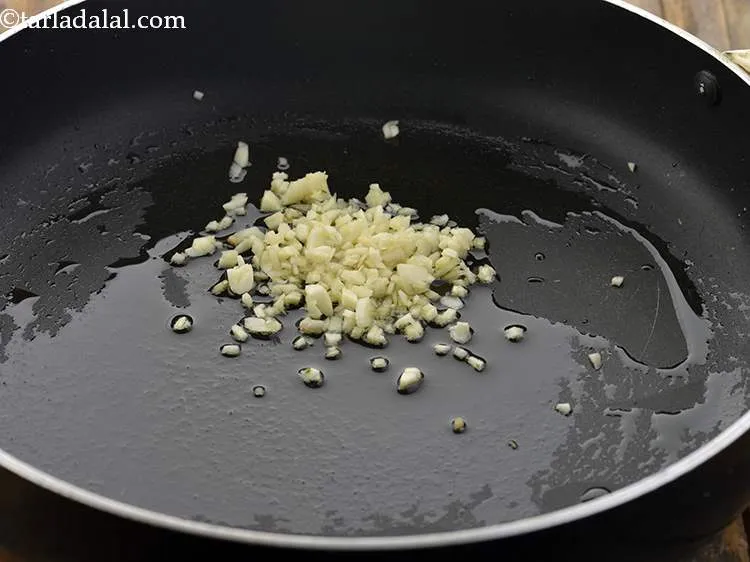 Step 17 – Add the garlic.