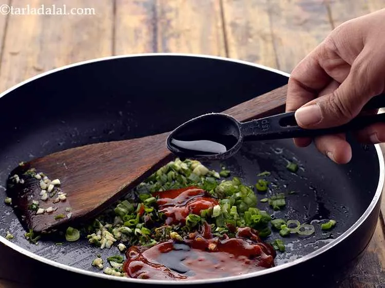 Step 23 – Add the soya sauce.