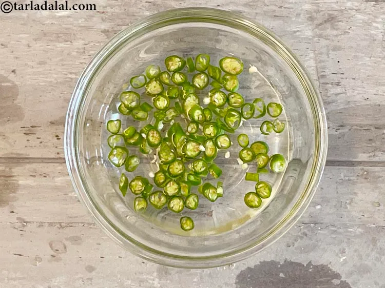 Step 5 – Add 1&nbsp;tbsp&nbsp;<a href="glossary-chopped-green-chilli-820i">chopped green chillies</a>.&nbsp;Antioxidant&nbsp;<a href="https://www.tarladalal.com/recipes-for-Juices-Rich-in-Vitamin-C-805" target="_blank">vitamin C</a>&nbsp;in&nbsp;<a href="http://www.tarladalal.com/recipes-using-green-chillies-331">green chillies</a>&nbsp;protects the body from effects of …